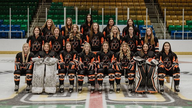 Prince Albert Bears pose for a team photo in black jerseys
