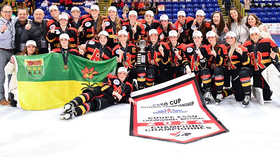 Regina Rebels pose at centre ice after winning the 2024 Esso Cup.