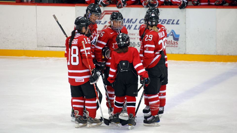 A young Maggie Connors beside Marie-Philip Poulin at the 2010 Four Nations Cup in St. John's, Newfoundland and Labrador.