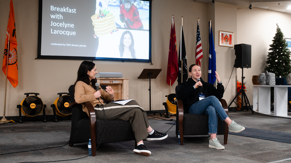 Kenzie Lalonde (right) interviews Jocelyne Larocque at the Indigenous Hockey Mini Summit.