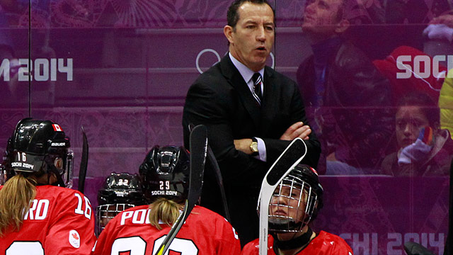 Head coach Kevin Dineen of the Portland Pirates talks to players