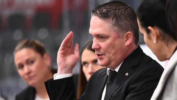 Troy Ryan speaks while on the bench for Canada's National Women's Team
